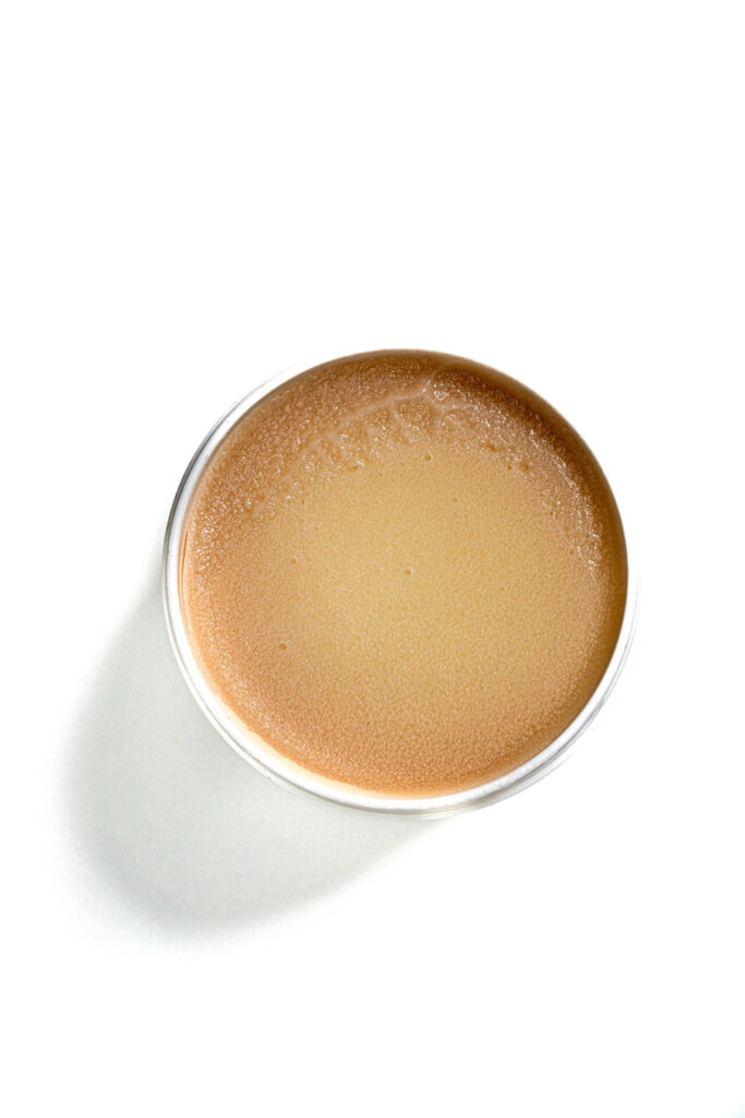 Pot de Baume n°57 Clauderer ouvert, baume coiffant et curatif pour cheveux crépus et dévitalisés